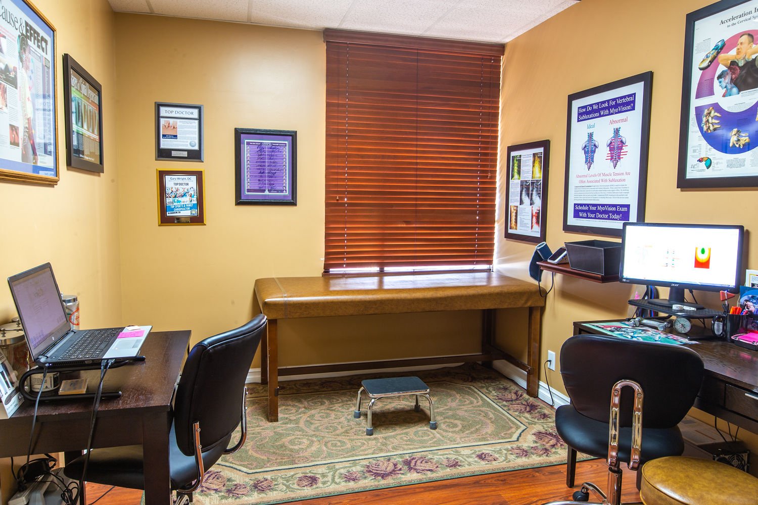 Doctor office with computers and medical education materials