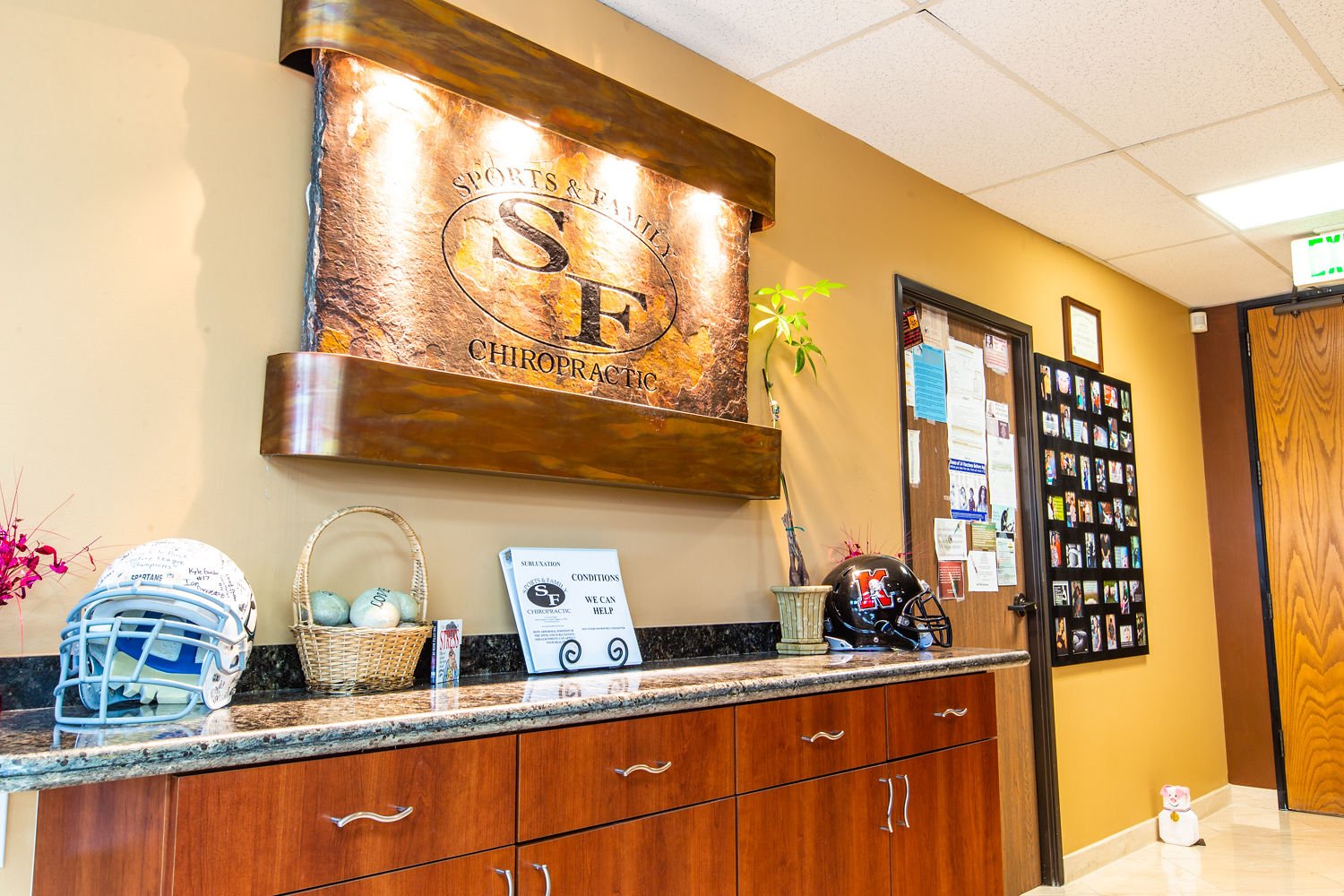 Reception desk with Sports & Family Chiropractic logo