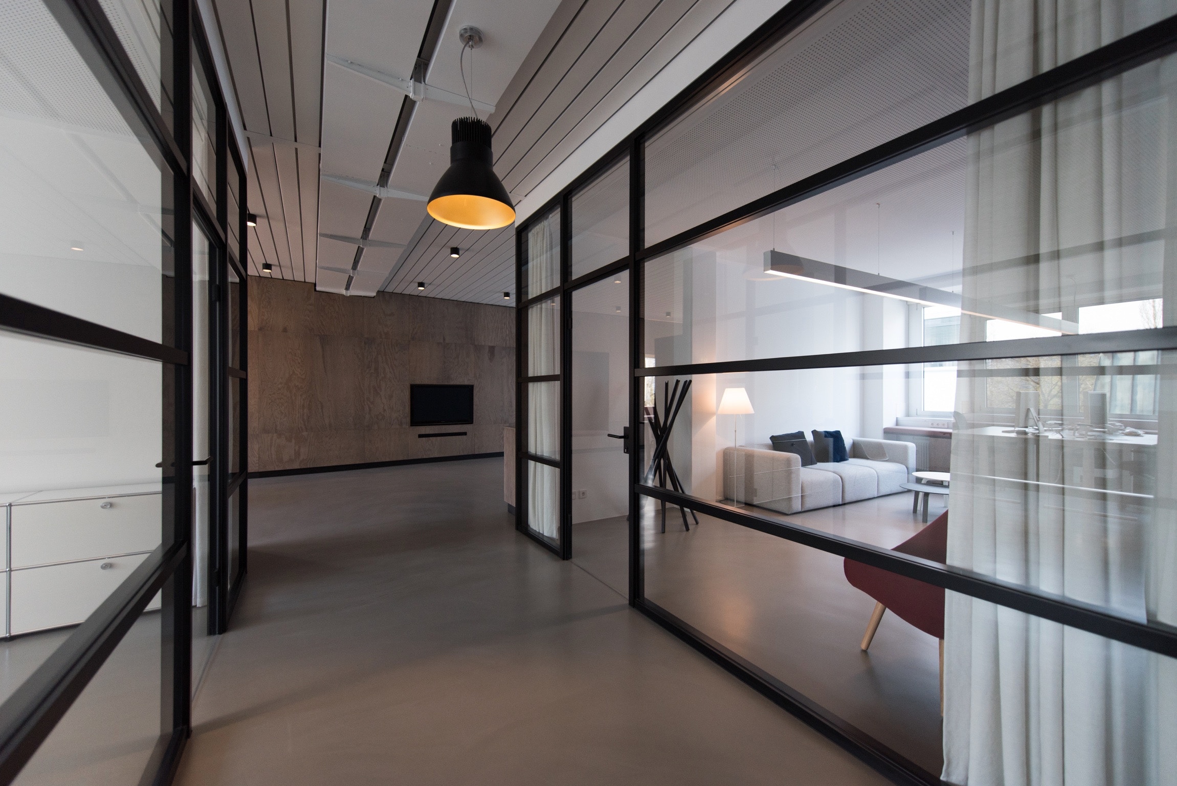 Modern office interior with glass partitions and contemporary design