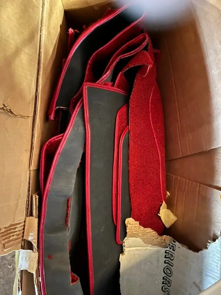 Red and black floor mat carpet set in original box