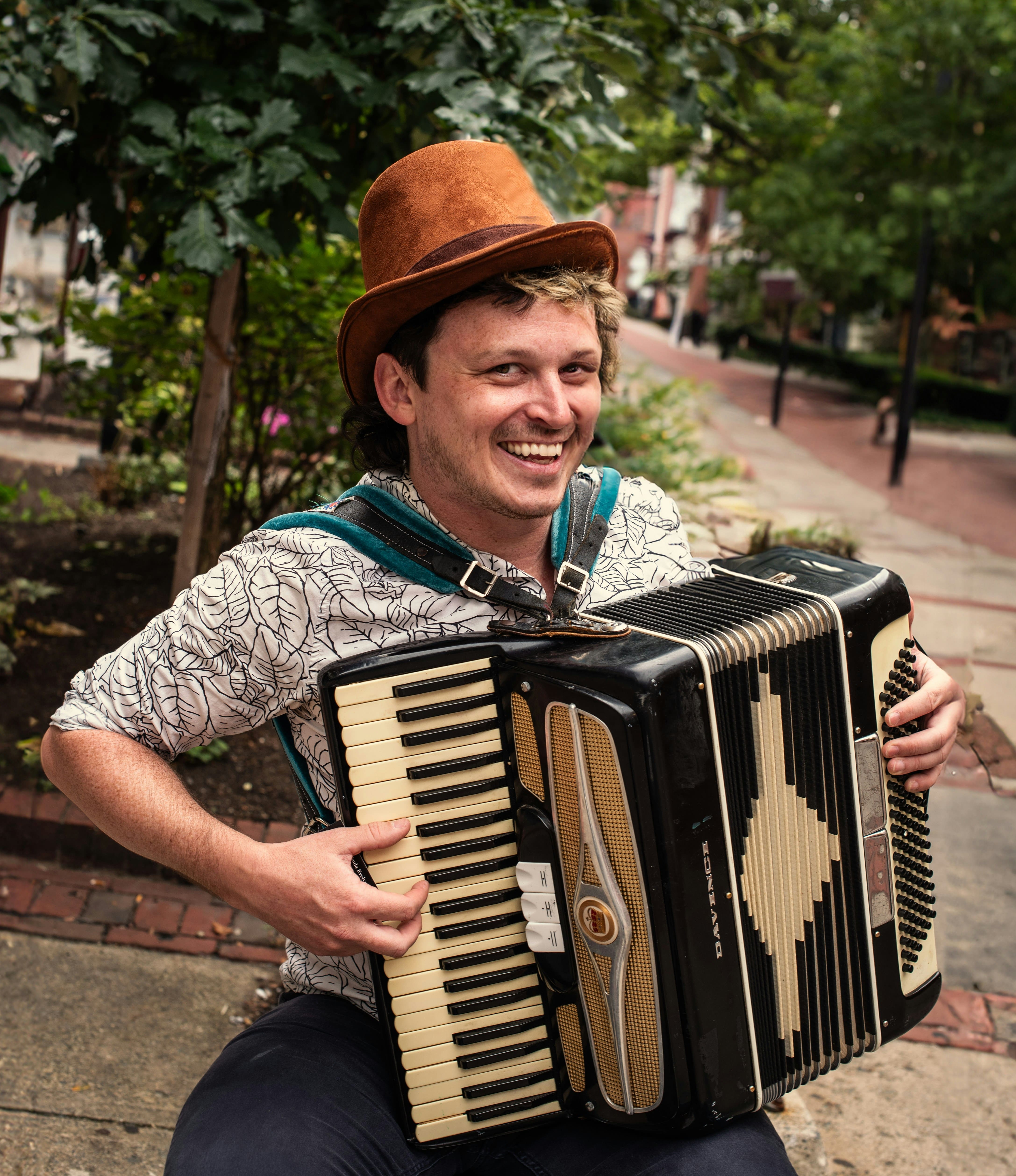 Accordion player with hat
