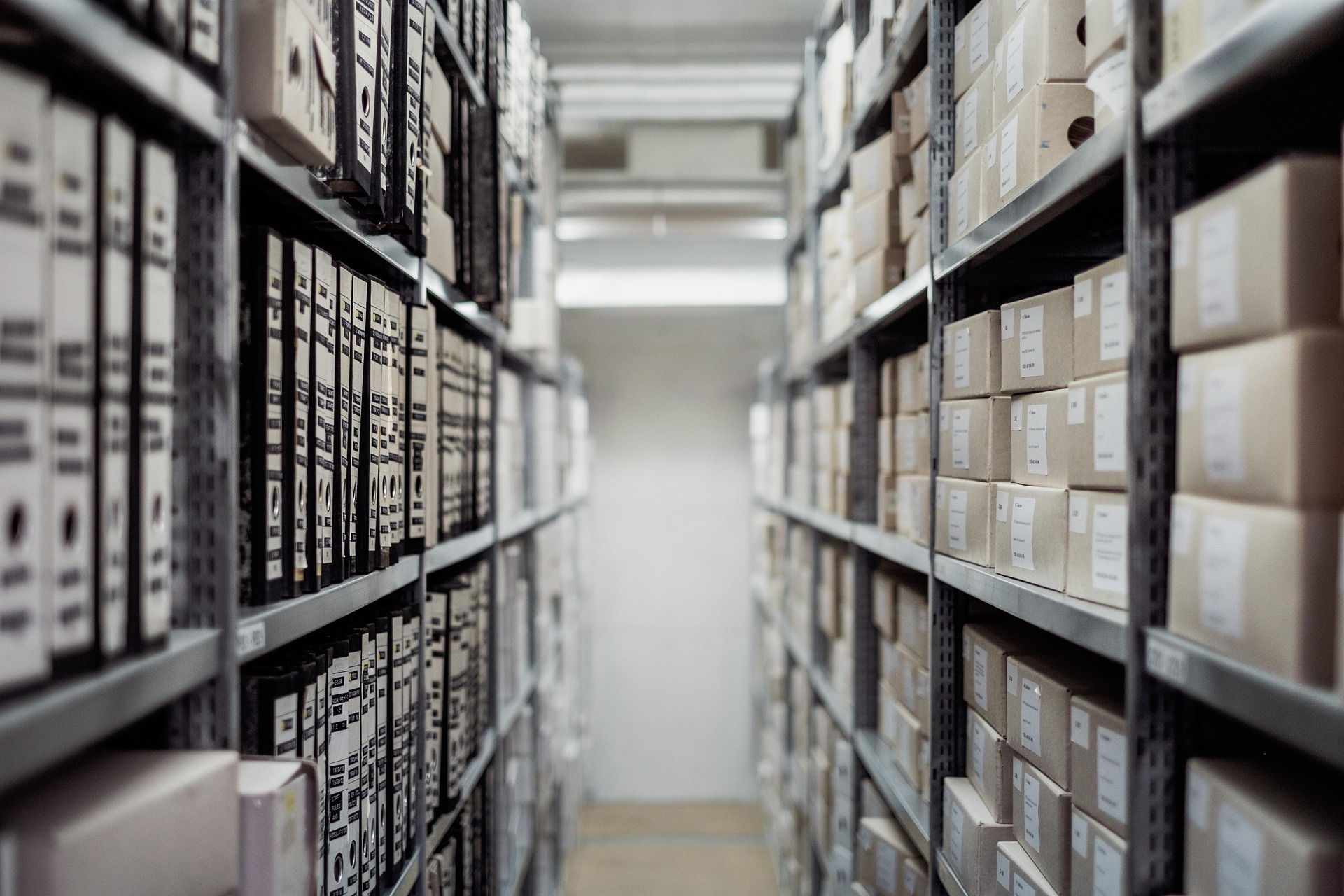 Organized medical supplies in a warehouse aisle