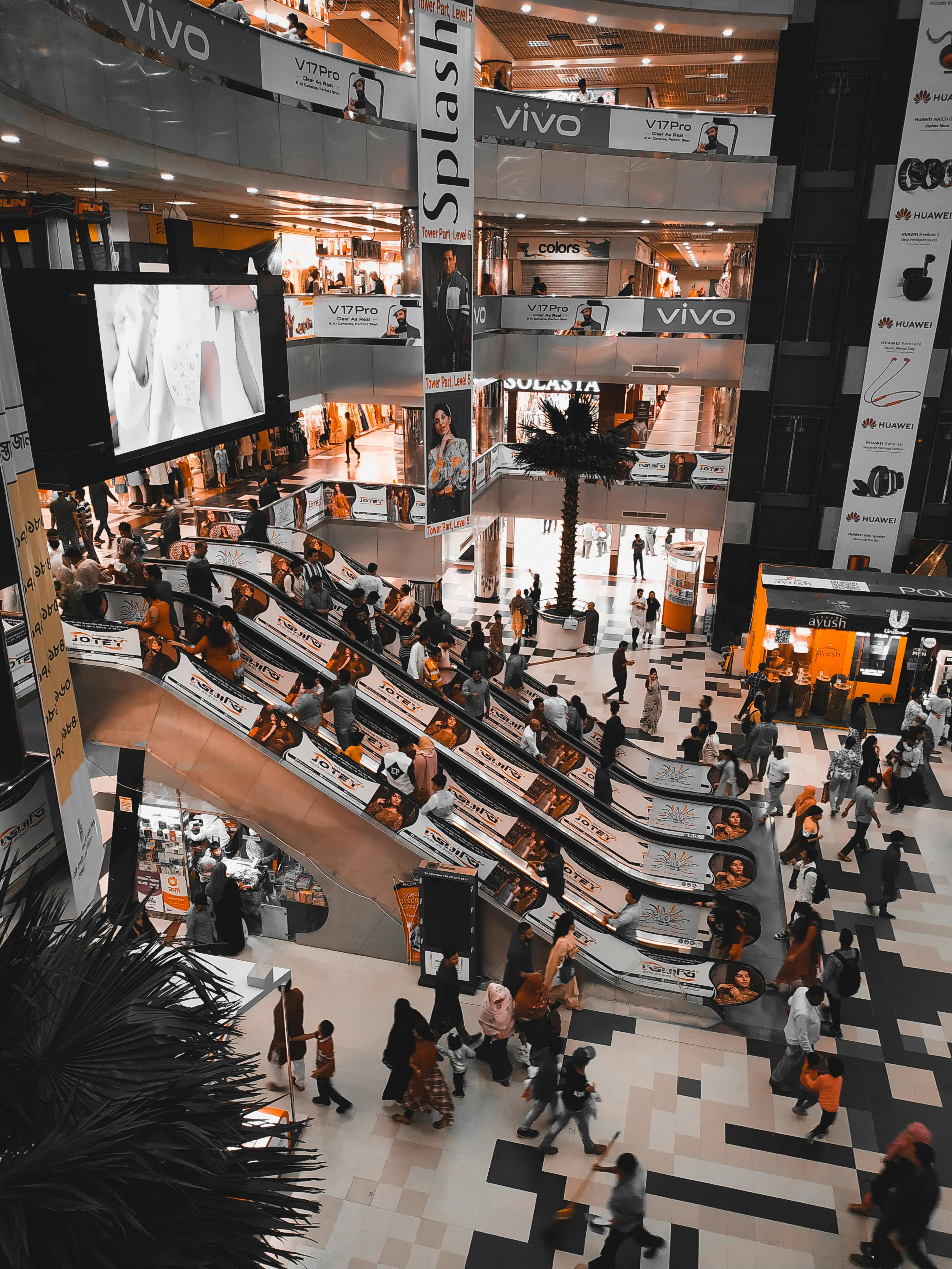 Multi-level shopping mall showing economic activity and retail operations optimization