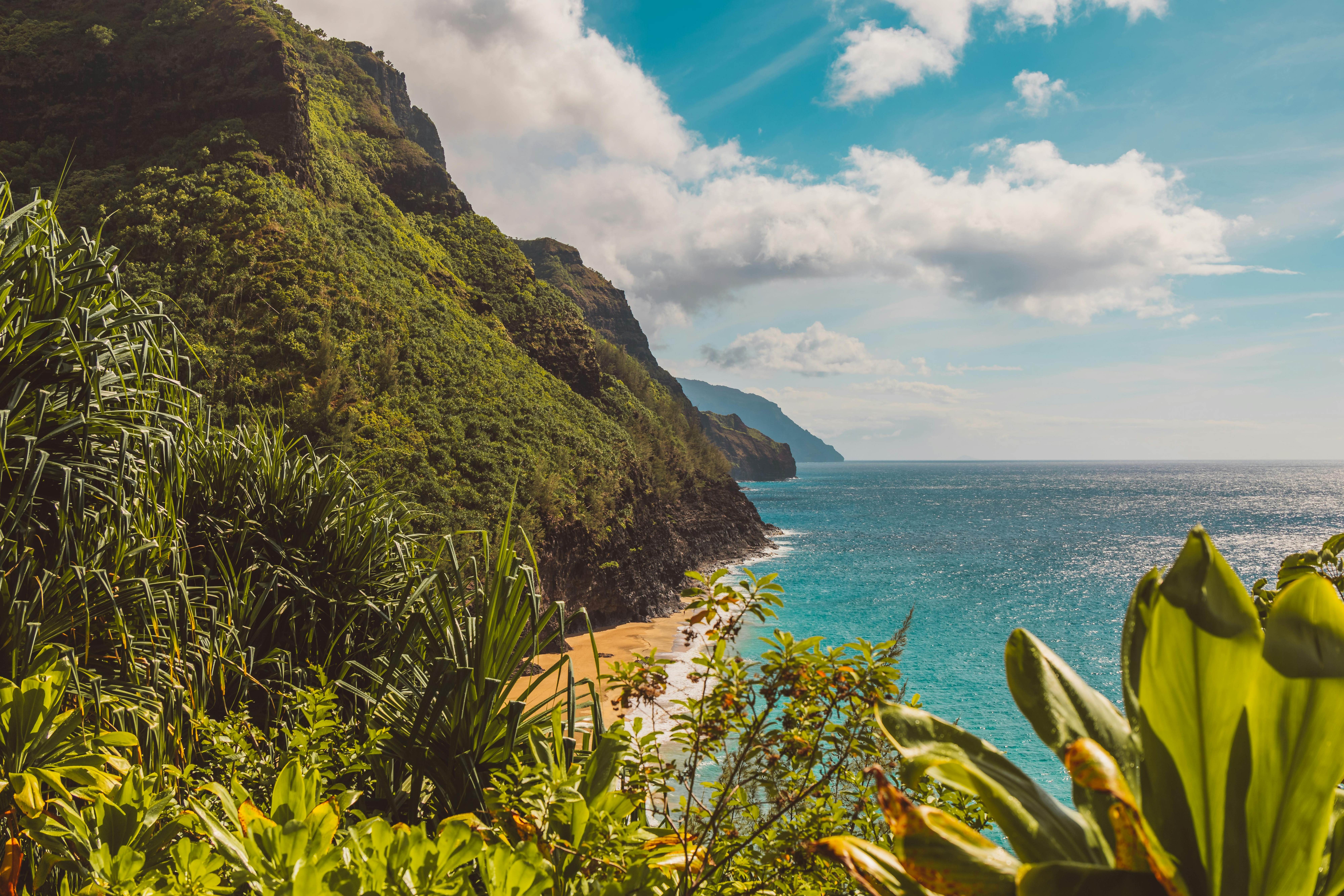 Na Pali Coast with lush green cliffs and turquoise ocean