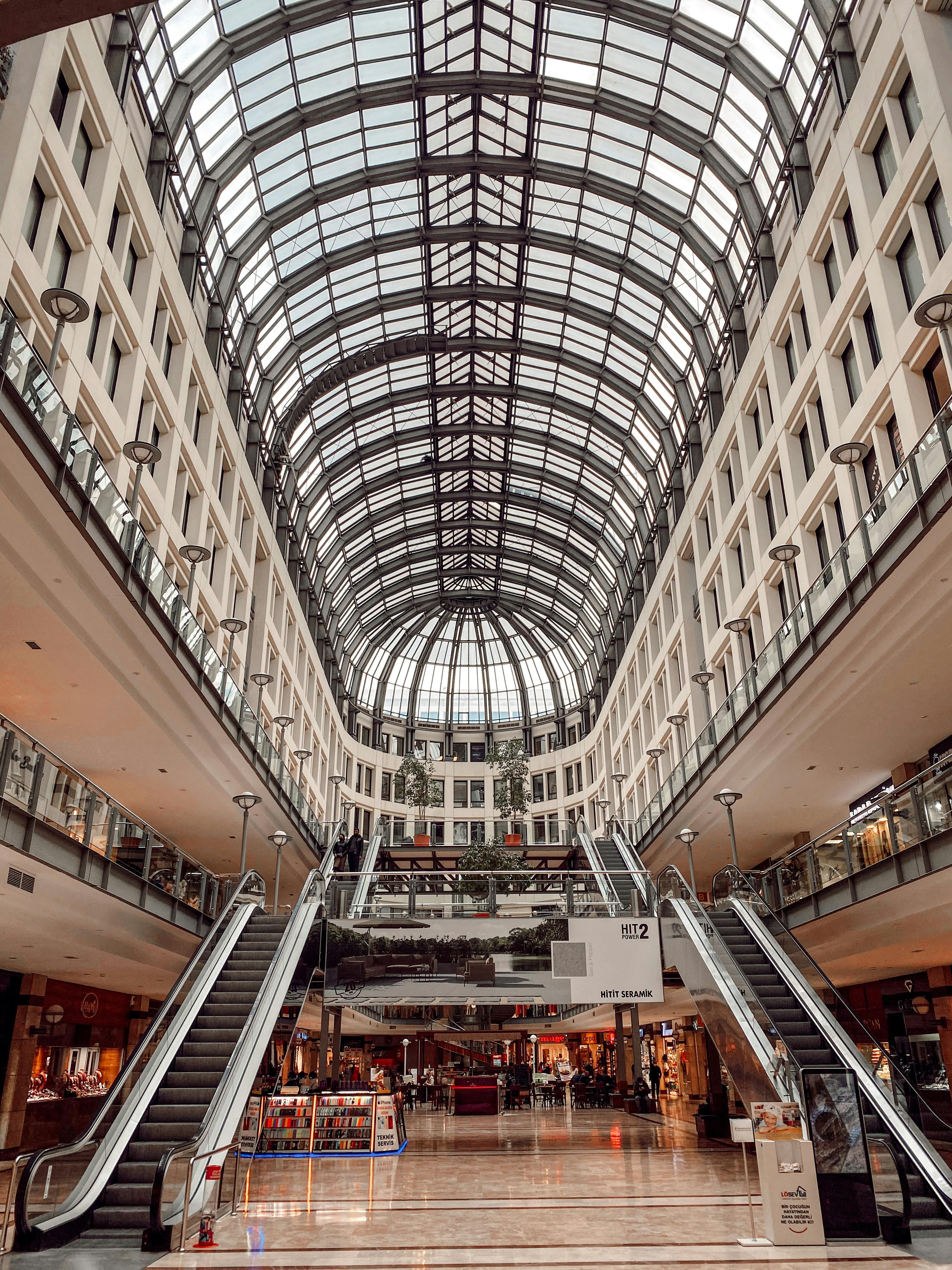Modern mall interior with multiple levels showing foot traffic density and movement patterns