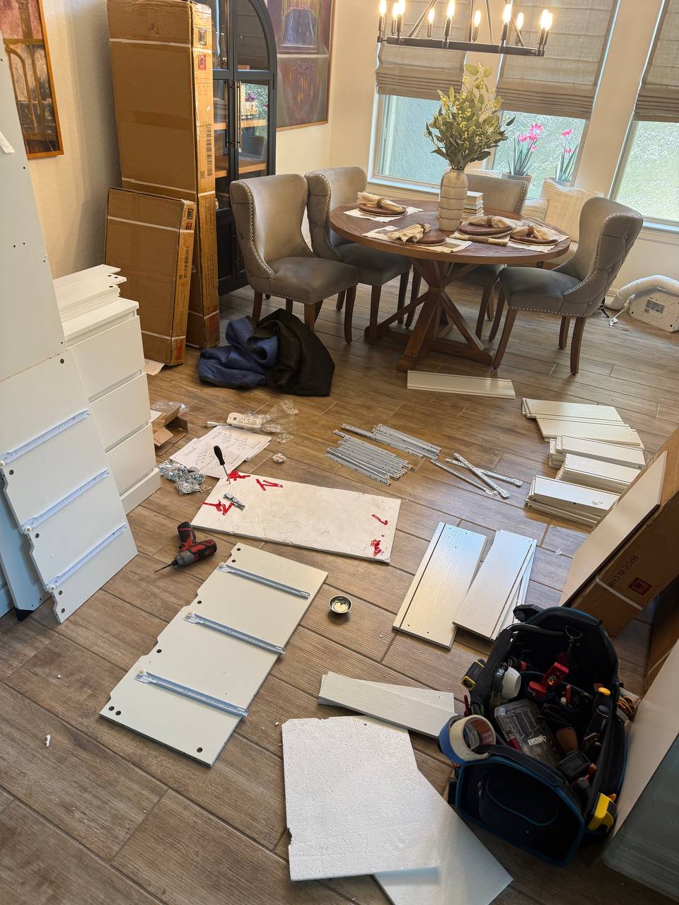 Dresser assembly in progress in dining room