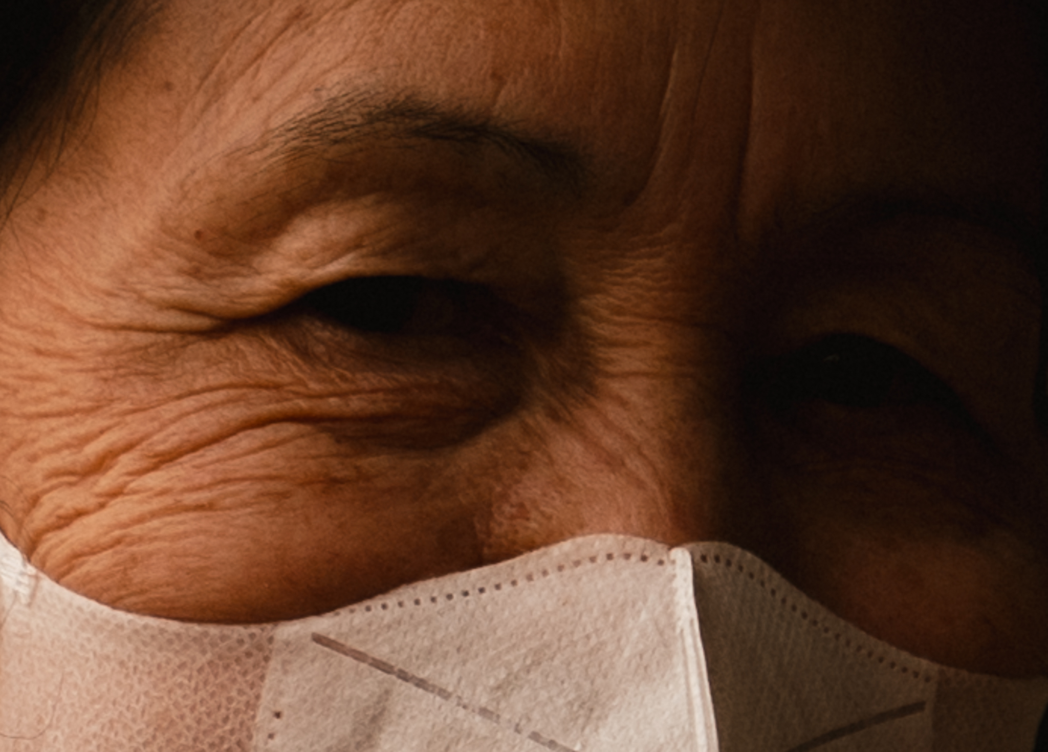 Close-up of elderly monk with closed eyes in deep contemplation