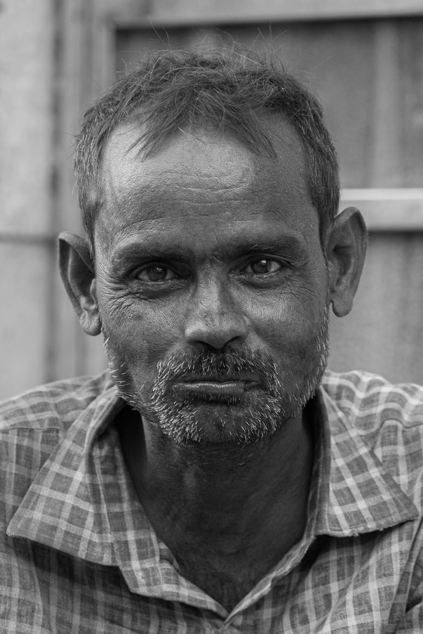 Portrait of Indian man with weathered face