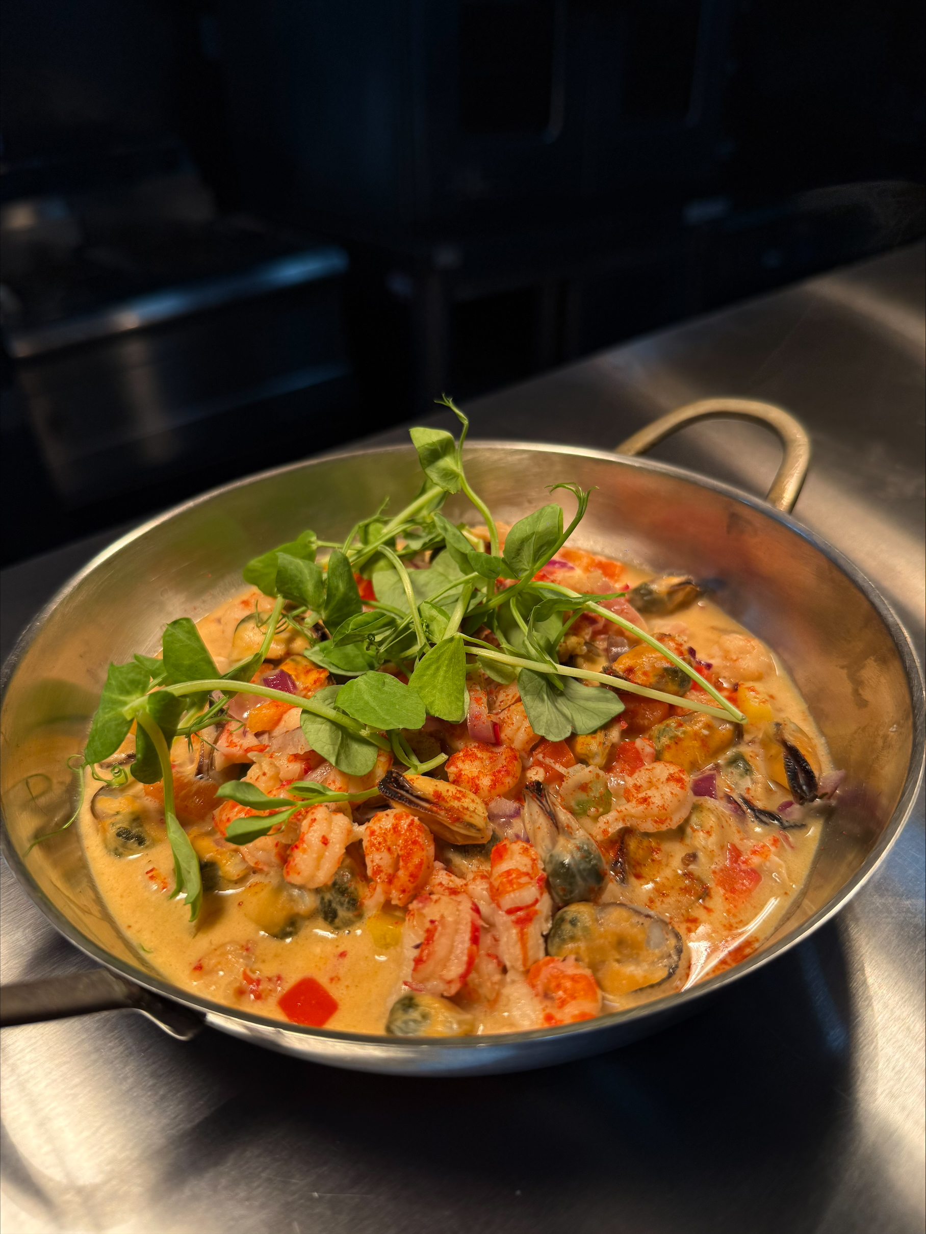 Creamy seafood dish with prawns and mussels