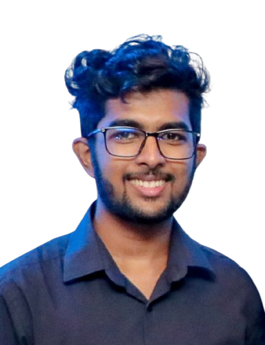 Rashmina smiling in a dark shirt