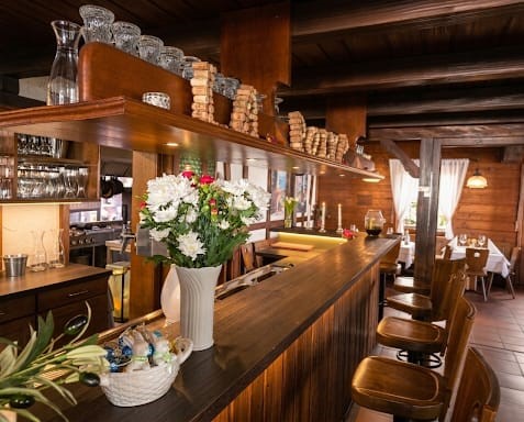 Elegant bar area with wooden counter