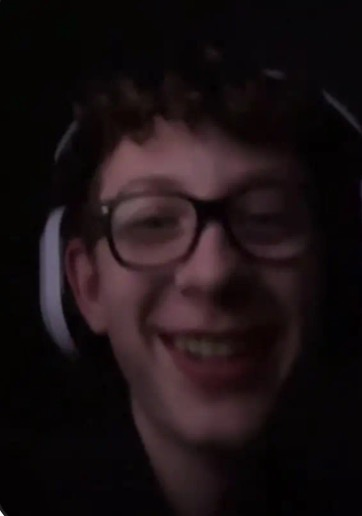 Rudy Rapacon smiling in a gaming headset
