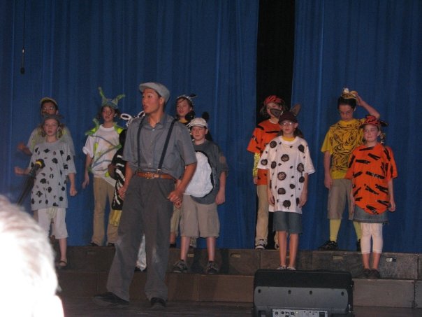 David performing in a school musical in Hungary
