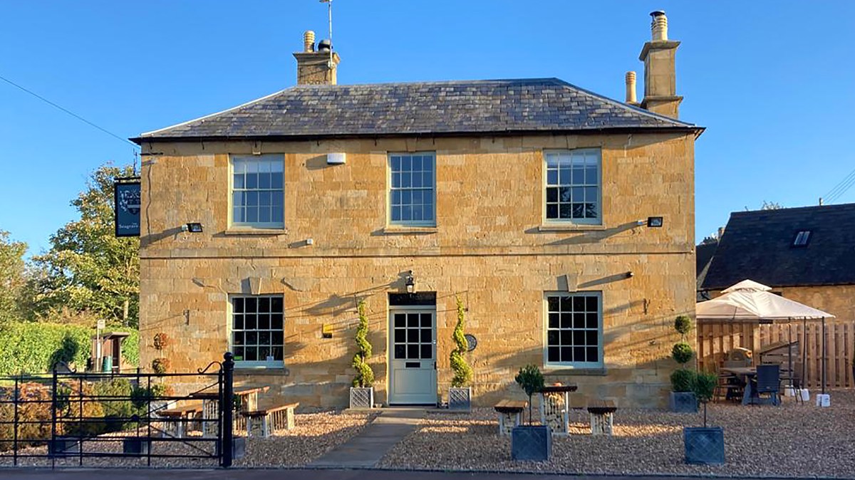 Completed hotel exterior with refurbished sash windows