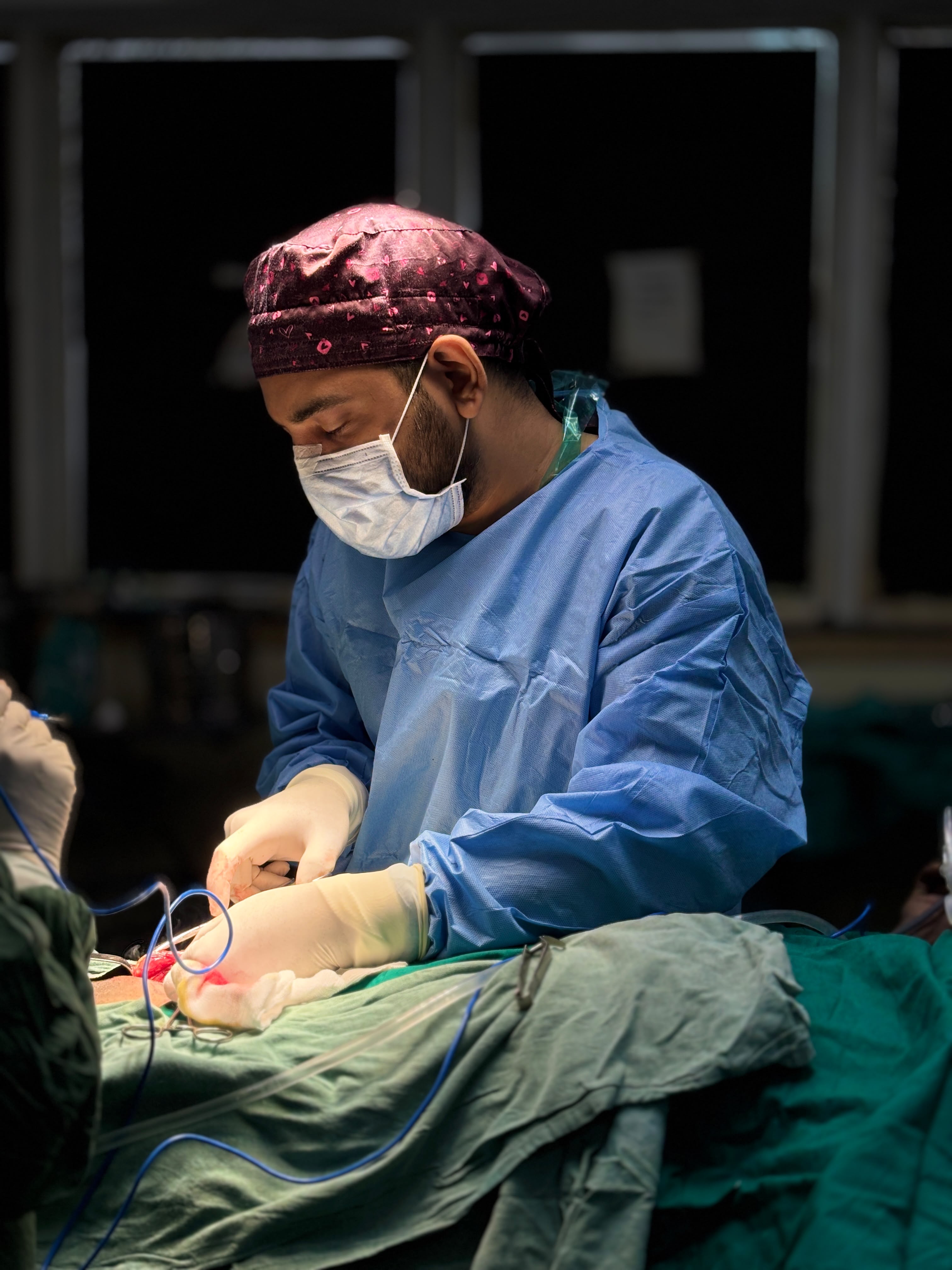 Dr. Rehan Hussain performing surgery