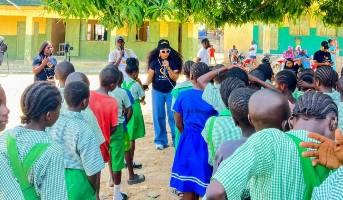 Foundation team addressing children at school event