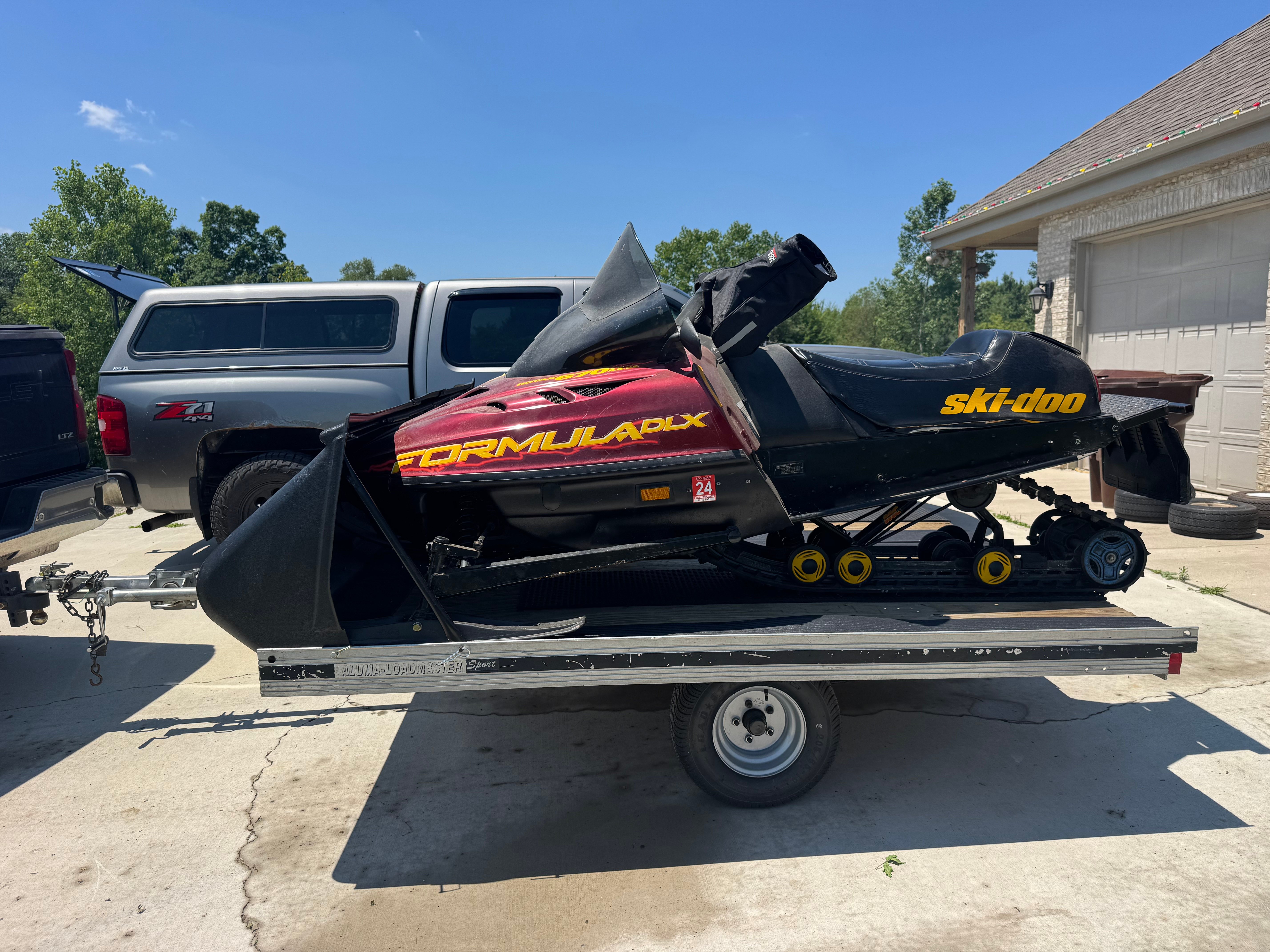 8x8 Aluma Loadmaster snowmobile trailer for rent in Eaton Rapids, MI — fits 2 sleds