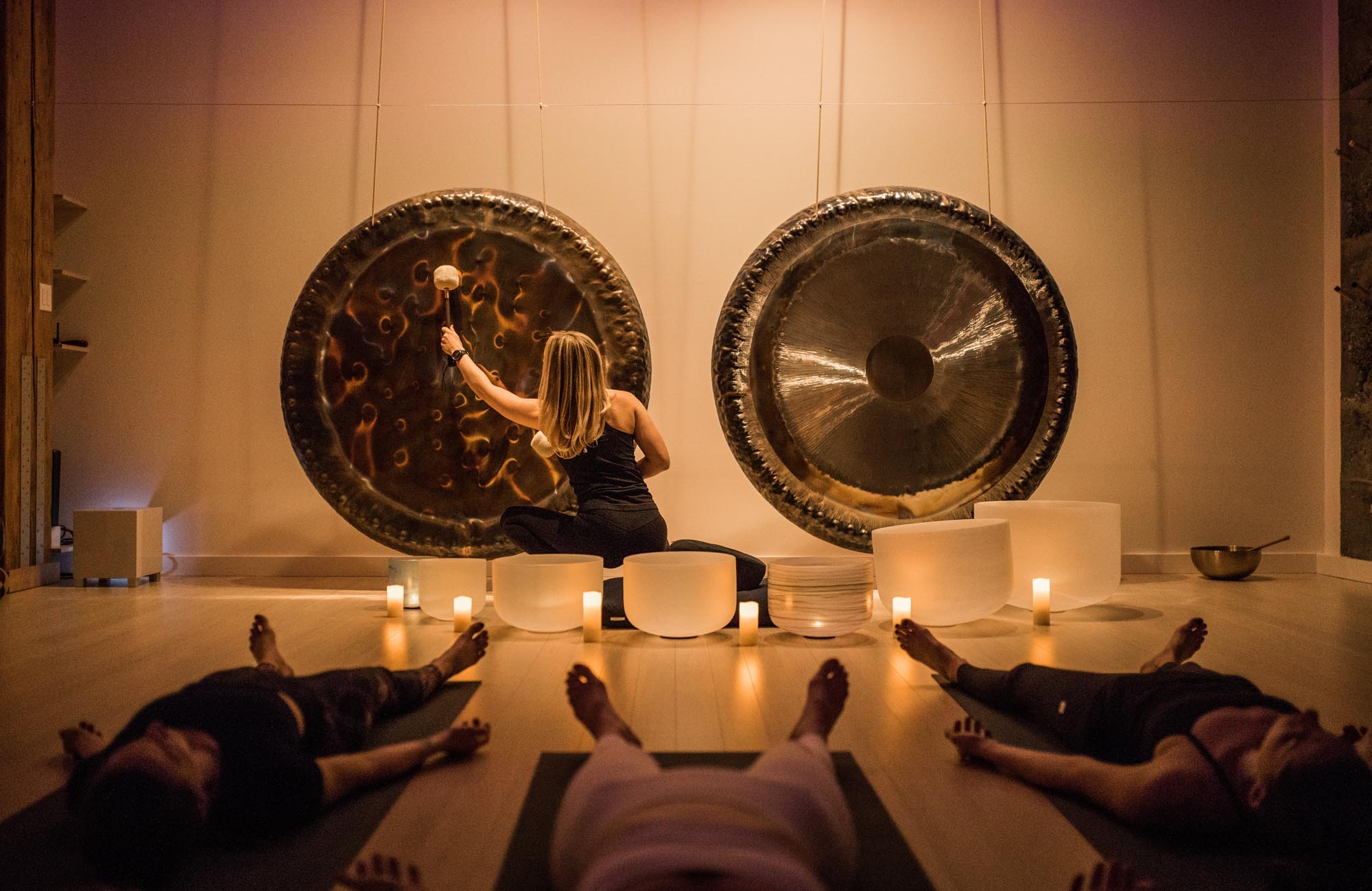 Sound bath session with gongs, crystal bowls and candles