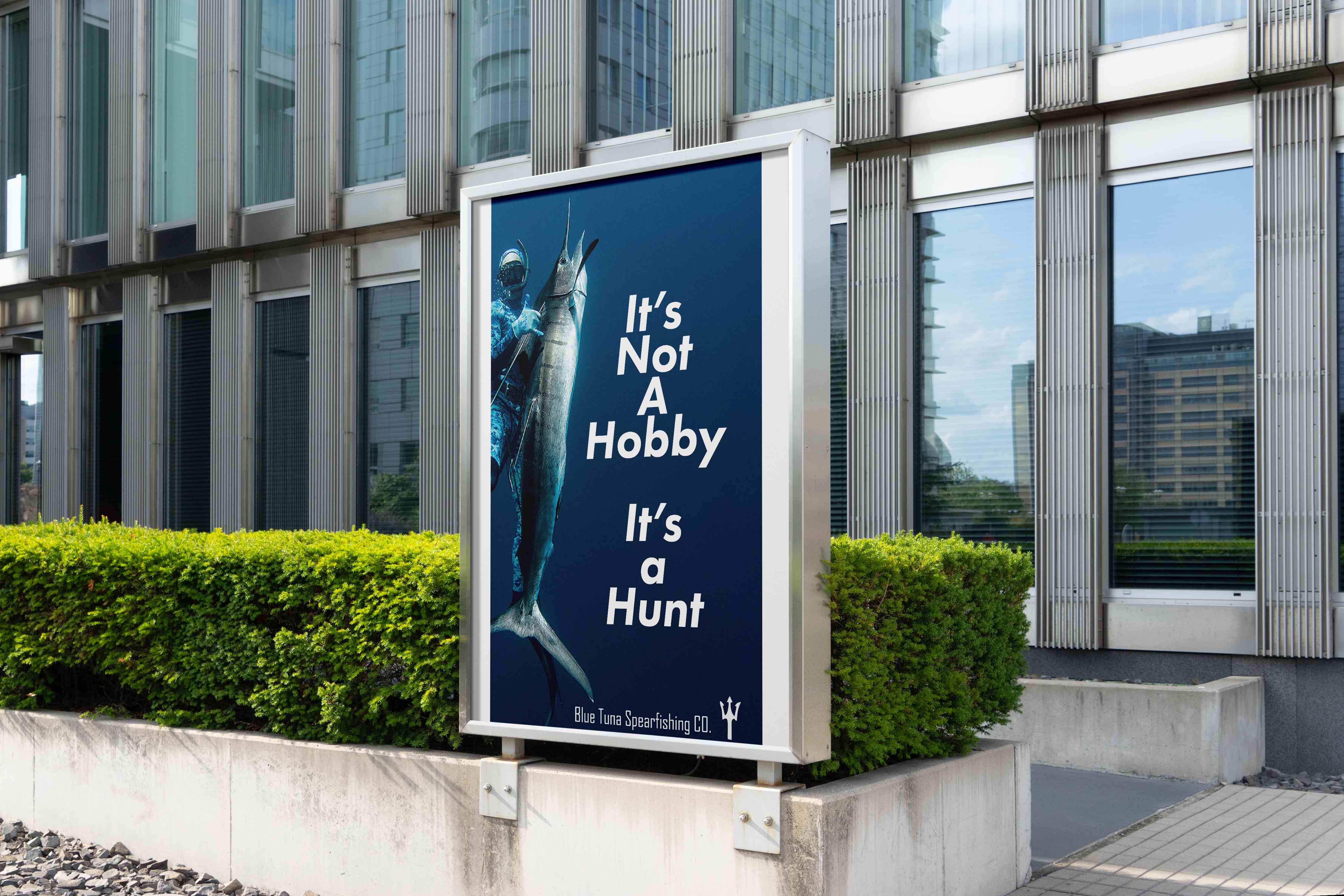 Blue Tuna Spearfishing billboard mockup in urban setting — It's Not A Hobby, It's a Hunt