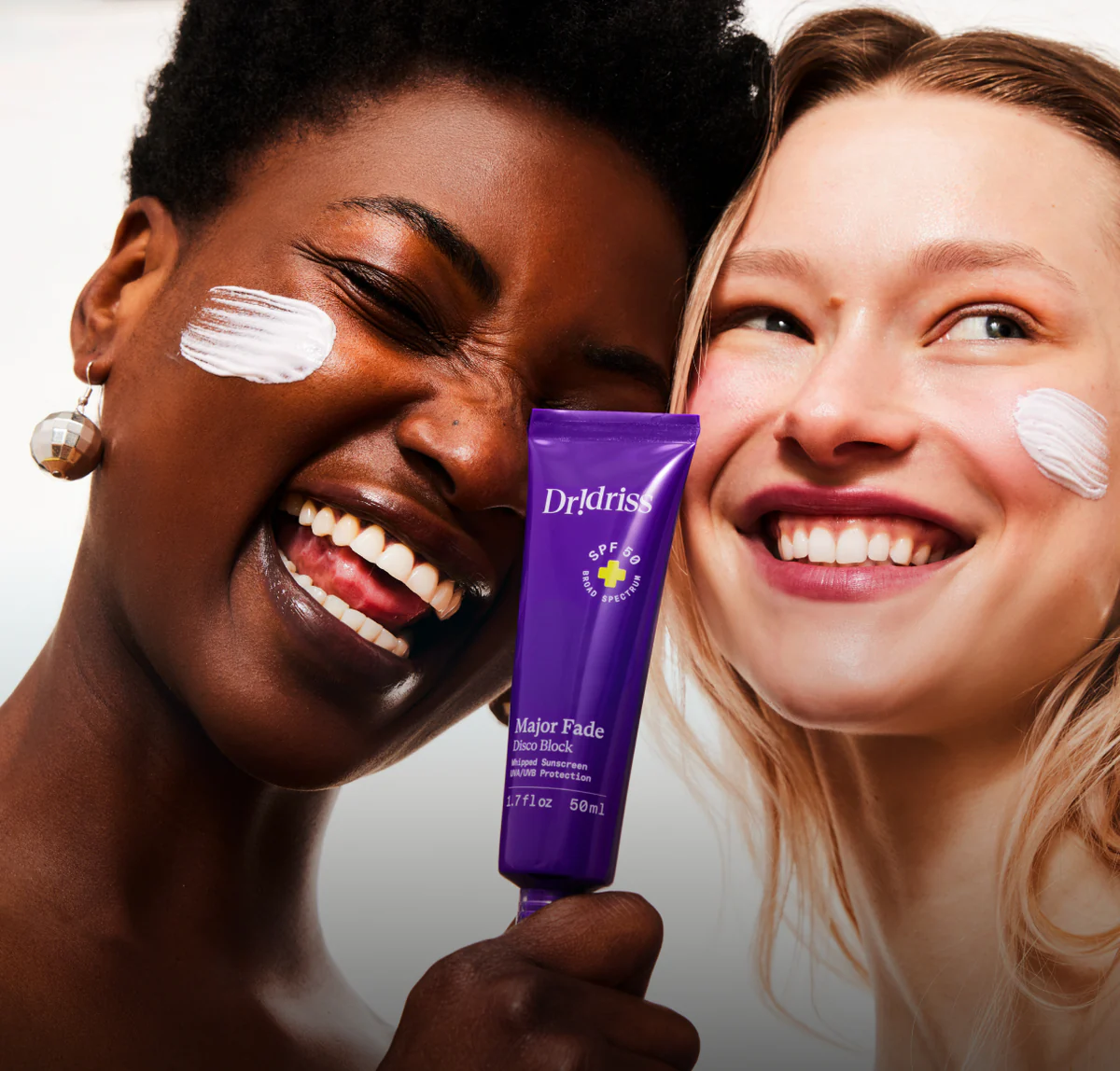 Two women with skincare products
