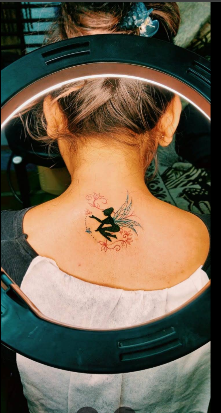 Colorful fairy tattoo art at Kaizen
