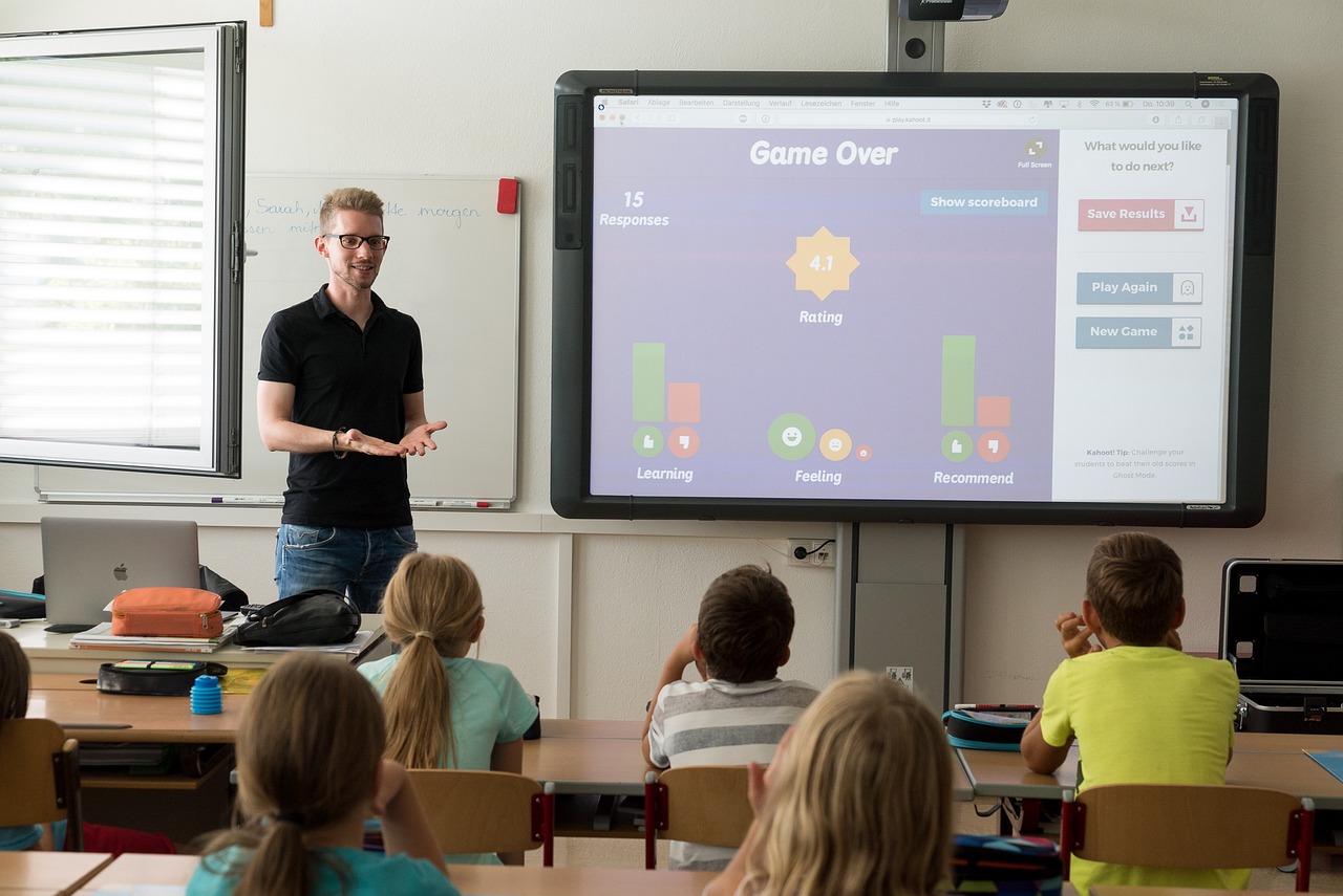 Teacher using interactive display for modern classroom management