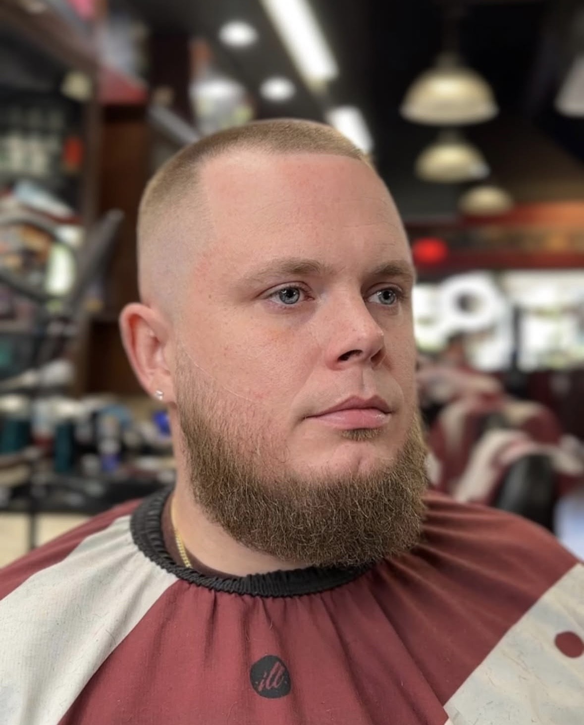 Adrian Velez's buzz cut with full beard grooming