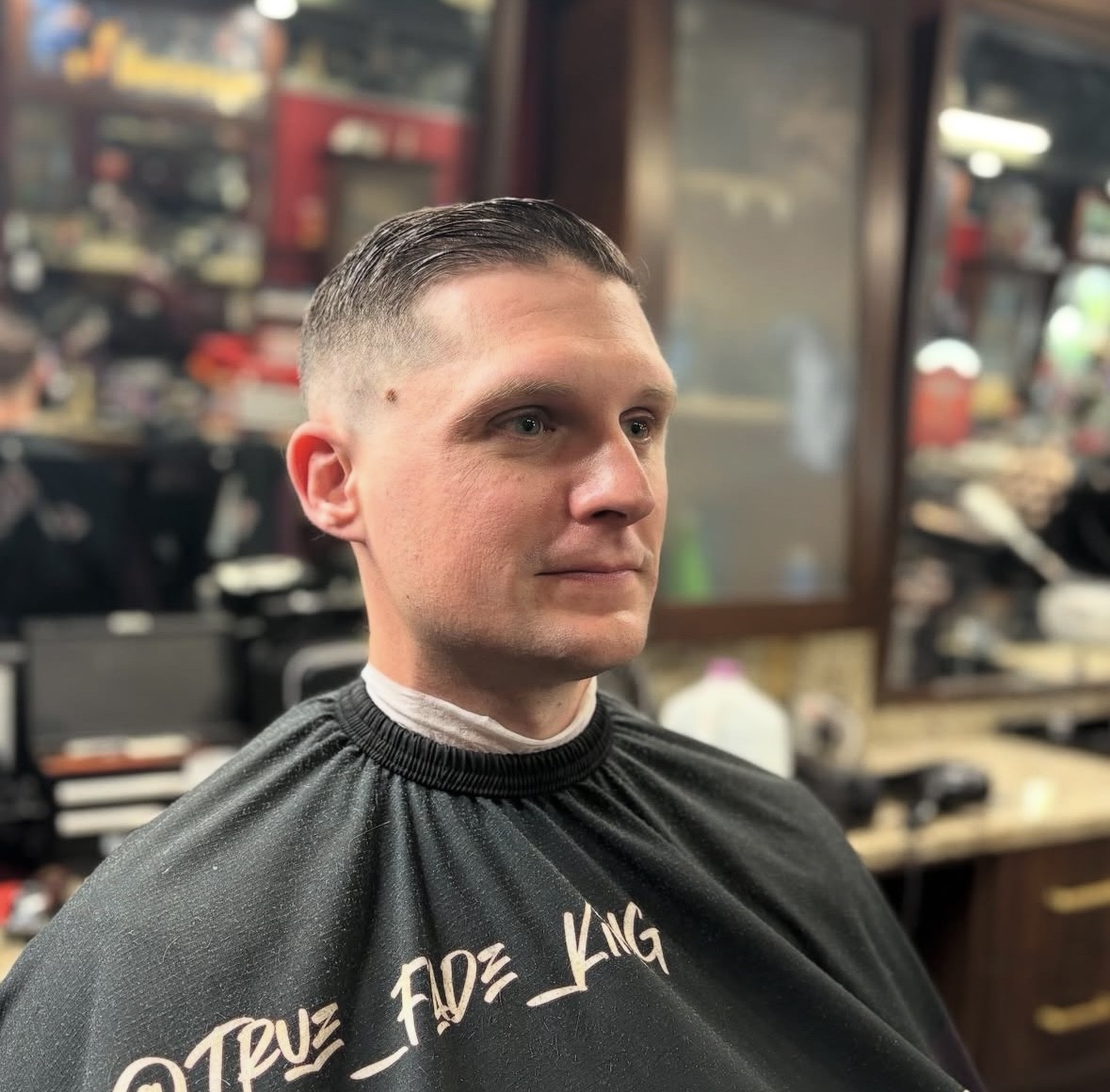Adrian Velez's clean military-style buzz cut