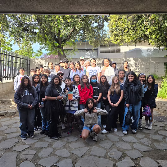 A diverse group of SJUSD students gathered together on campus