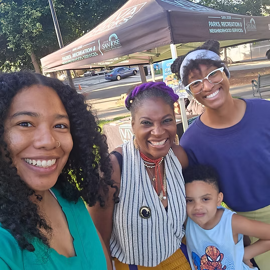 Tomara connecting with families at a neighborhood community event