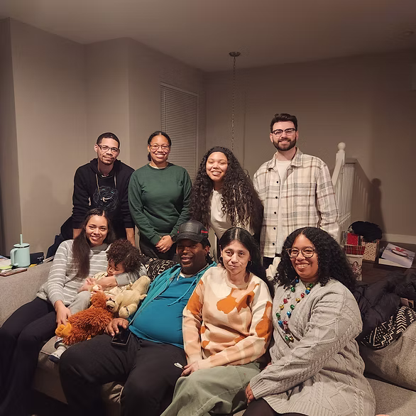 Tomara with family at a home gathering