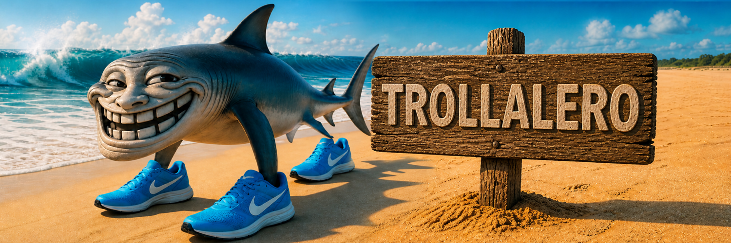 TROLLALERO troll shark with Nike sneakers on the beach