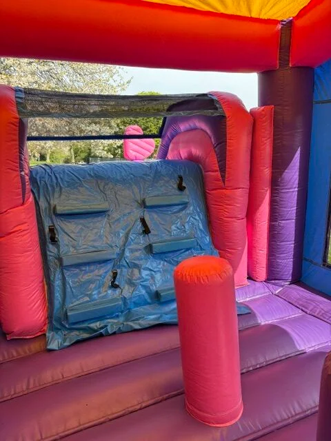 Unicorn bouncy castle interior climbing wall