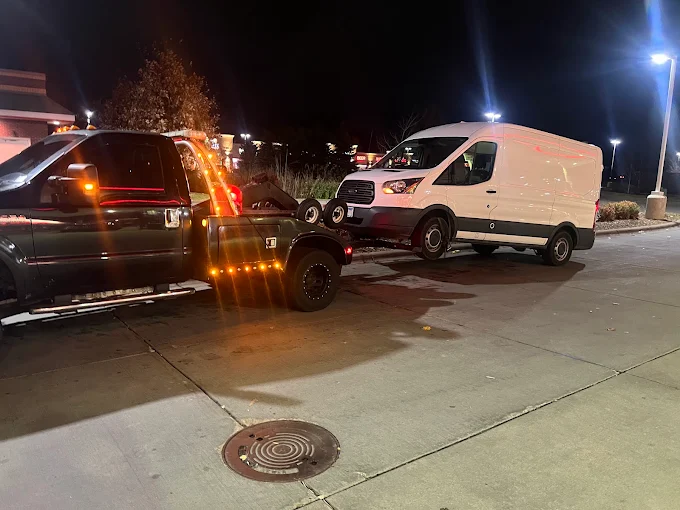 Tebbs tow truck recovering a vehicle at night