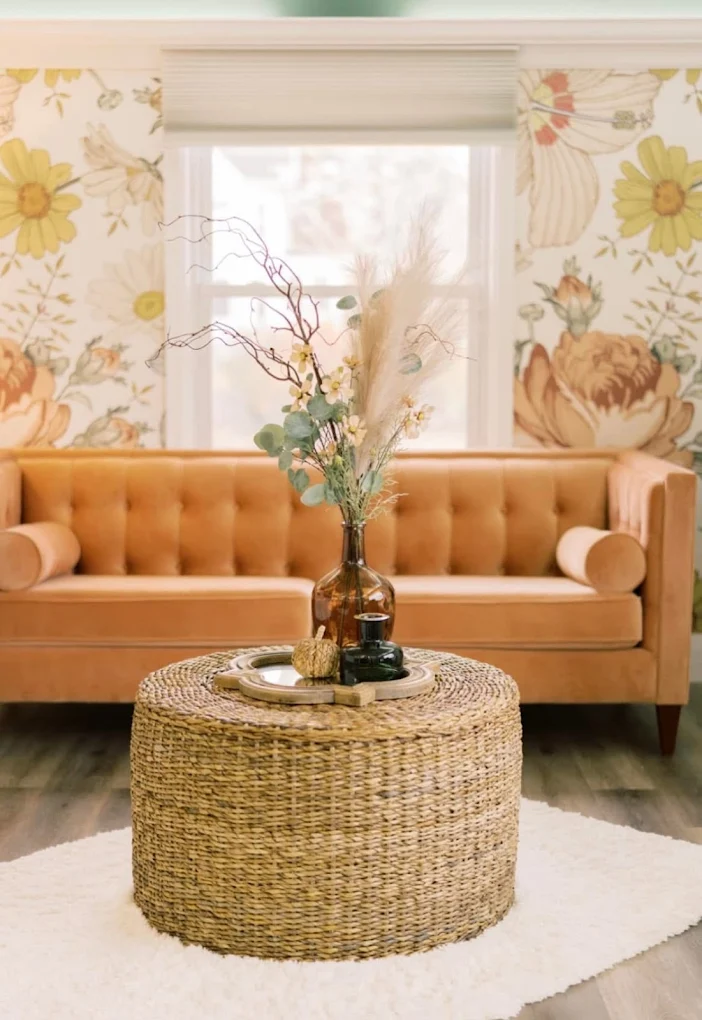 Arte Bella lounge detail with velvet sofa and wicker ottoman