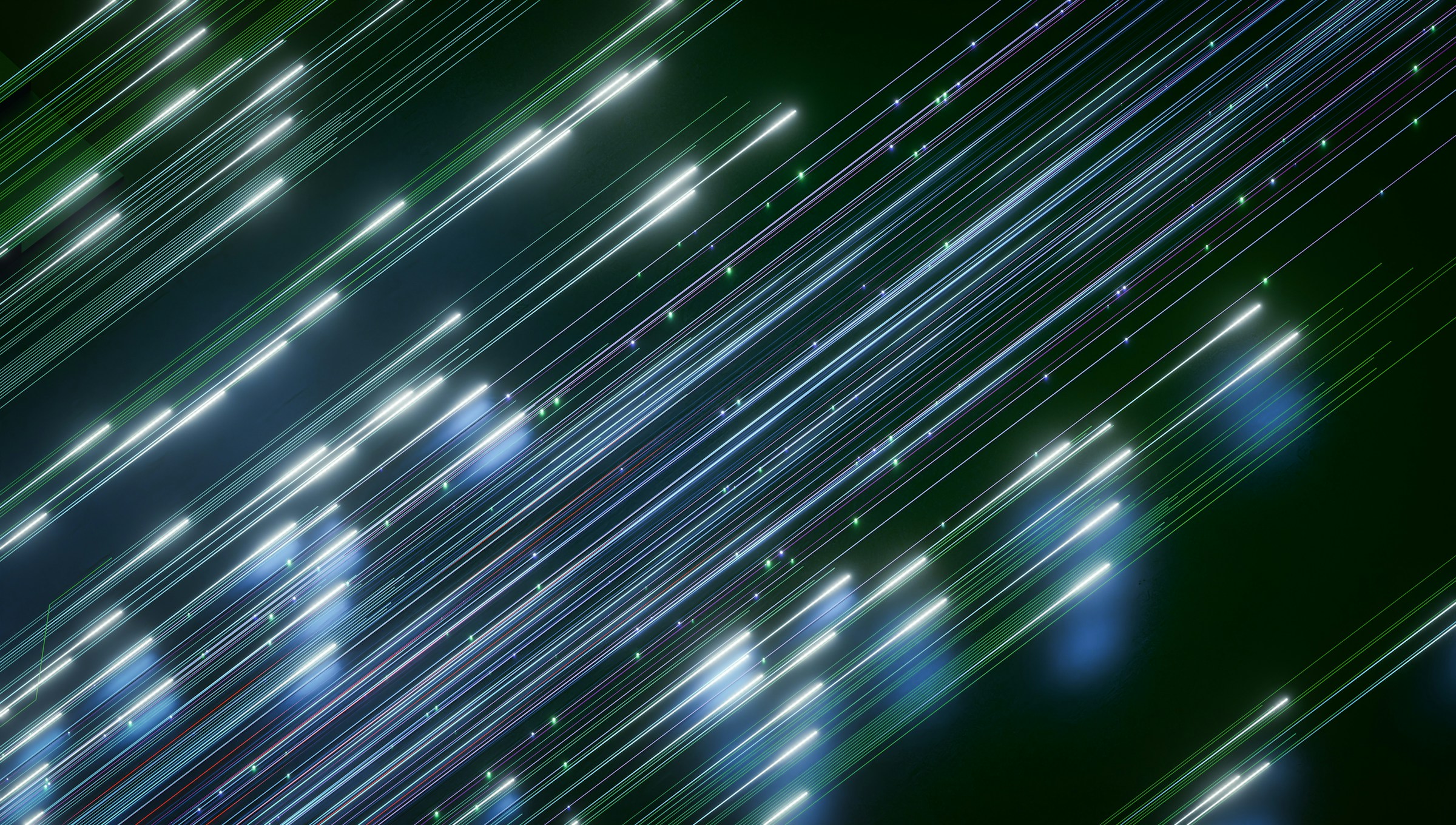 Abstract diagonal light streaks in green and blue representing energy data flow