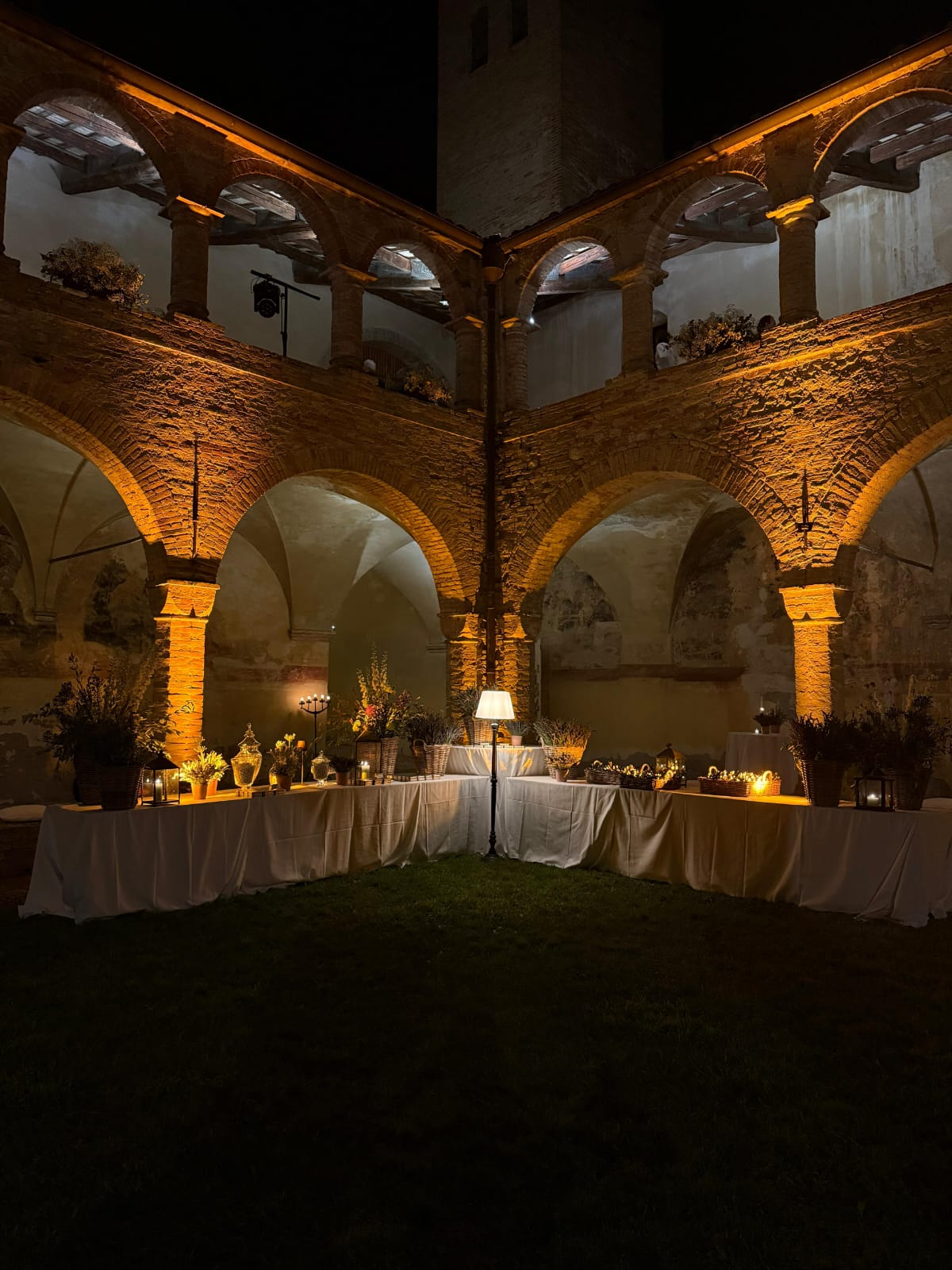 Elegant courtyard wedding lighting