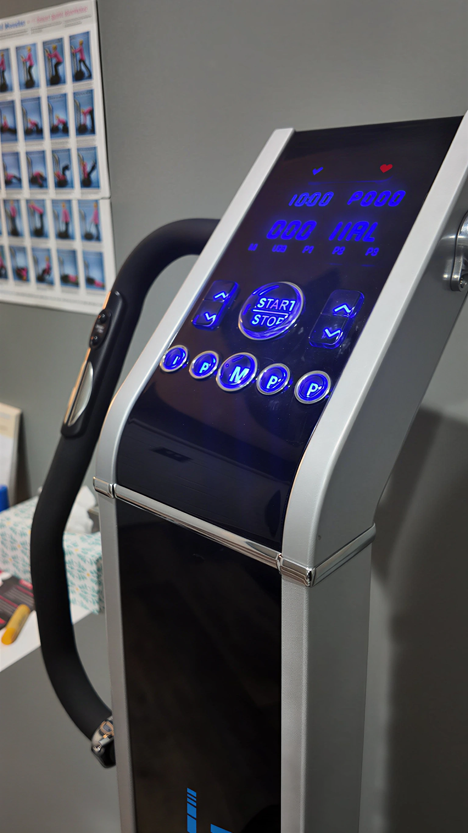 Vibration plate control panel with LED display showing frequency and intensity settings