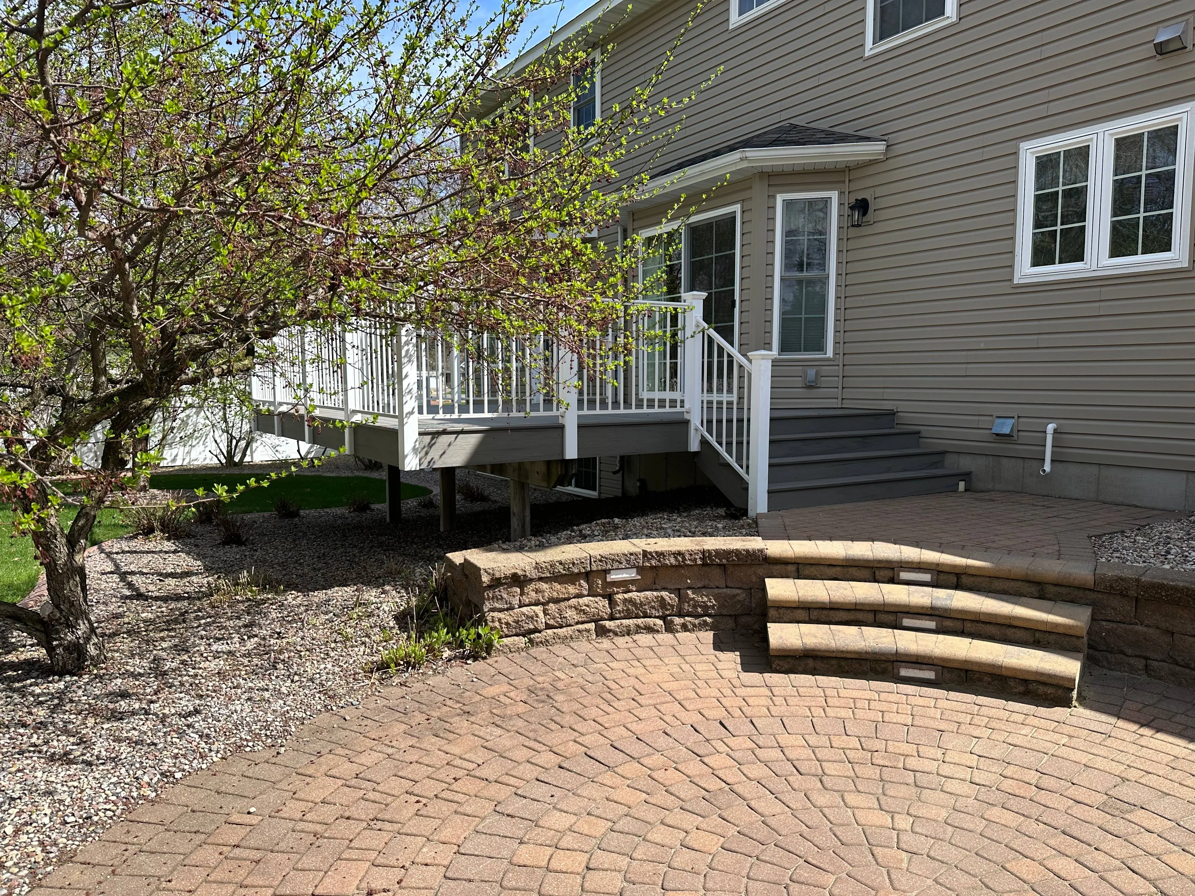 Patio Addition with Pavers — Addition project completed by Wilbur's Home Remodeling in Eau Claire, WI