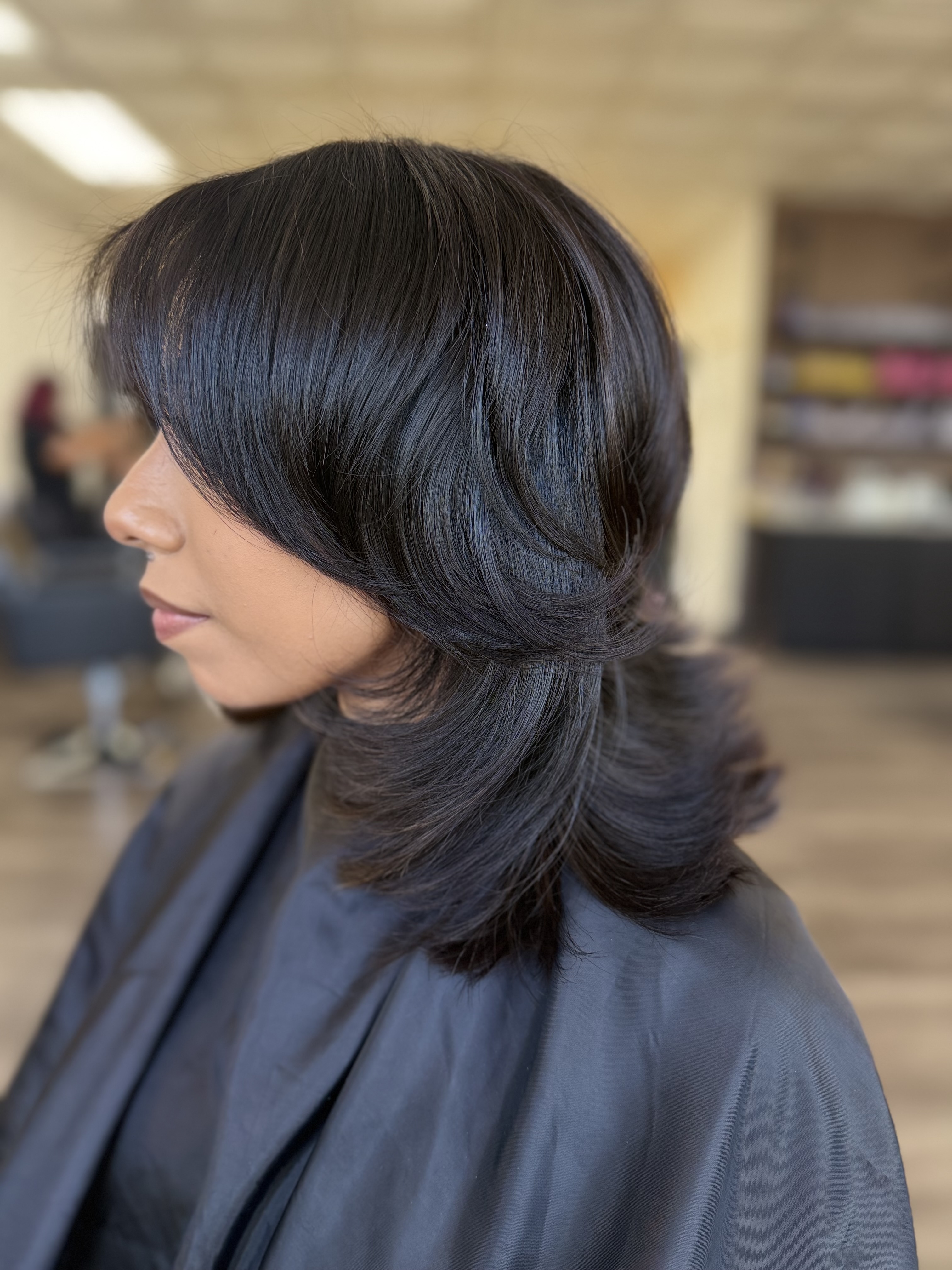 Women's layered haircut at The Hair Co. Salon in Phoenix, AZ