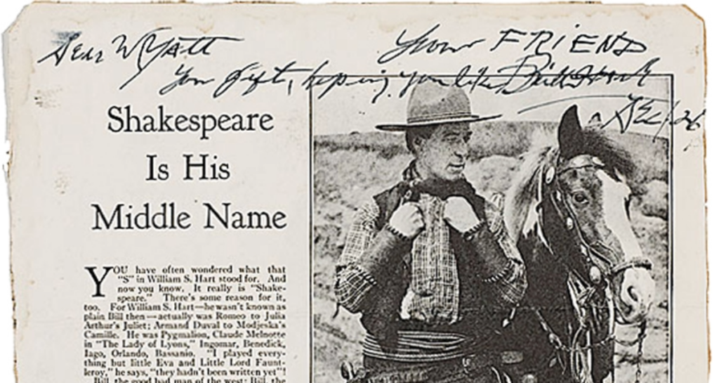A newspaper clipping titled ‘Shakespeare Is His Middle Name,’ with a photograph of Wyatt Earp beside a horse and handwritten notes across the top.